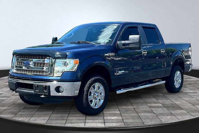 2014 Ford F-150 XLT in Blue — front three-quarter view