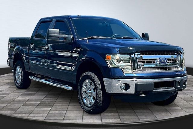 2014 Ford F-150 — rear three-quarter view