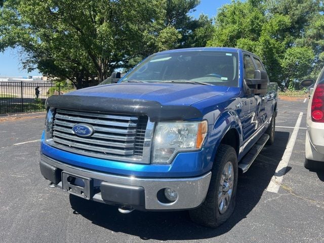 2010 Ford F-150 XL in Blue Flame Metallic — front three-quarter view