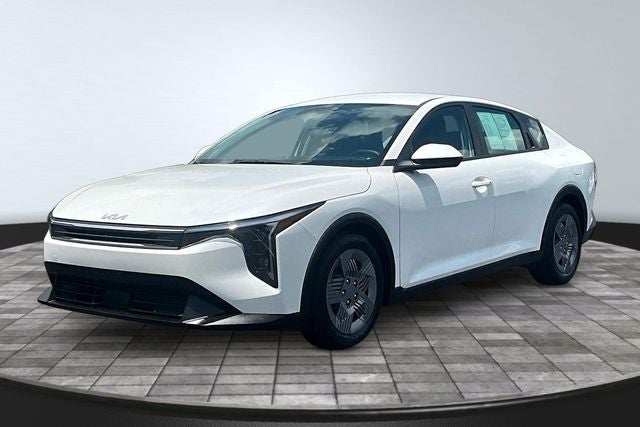2025 Kia K4 LX in Snow White Pearl — front three-quarter view