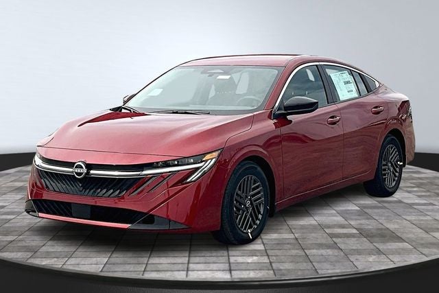 2026 Nissan Sentra SV in Scarlet Ember Tintcoat — front three-quarter view