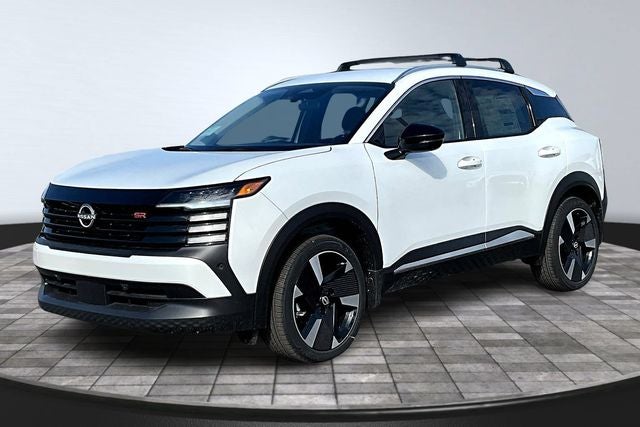 2026 Nissan Kicks SR in Aspen White Tricoat — front three-quarter view