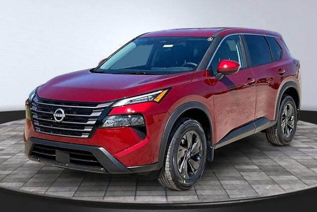 2026 Nissan Rogue SV in Scarlet Ember Tintcoat — front three-quarter view