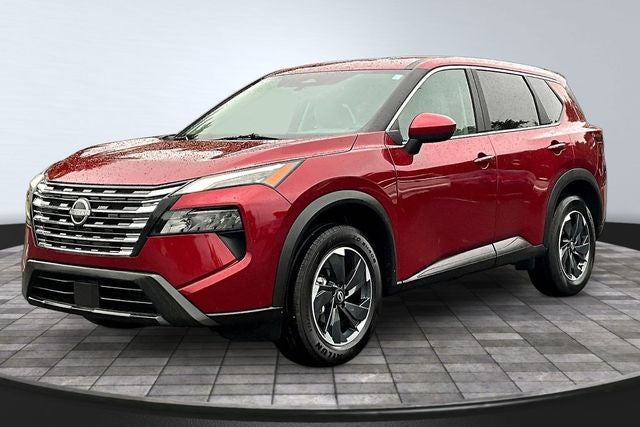 2025 Nissan Rogue SV in Scarlet Ember Tintcoat — front three-quarter view