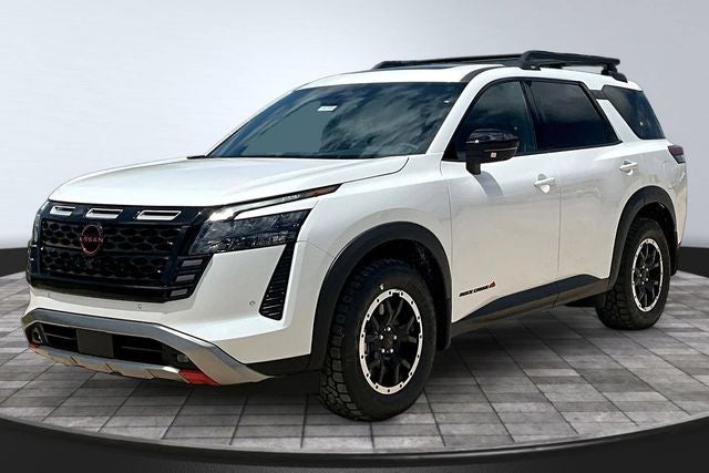 2026 Nissan Pathfinder Rock Creek in Everest White Pearl Tricoat — front three-quarter view