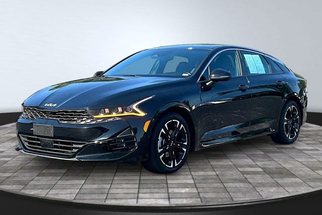 2024 Kia K5 GT-Line in Ebony Black — front three-quarter view