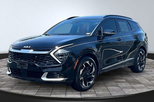 2025 Kia Sportage SX-Prestige in Ebony Black — front three-quarter view