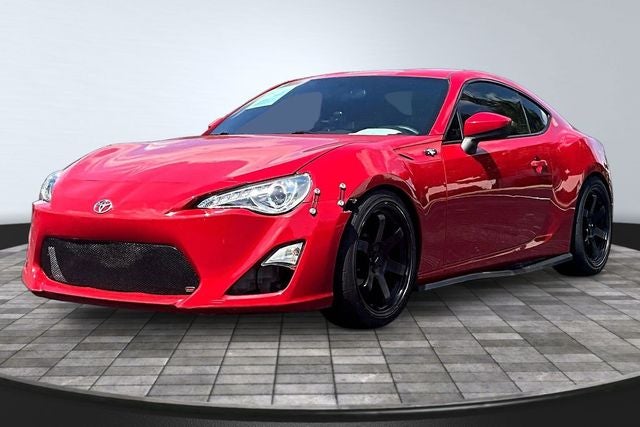 2013 Scion FR-S Base in Firestorm — front three-quarter view
