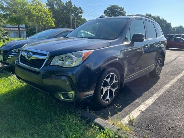 2014 Subaru Forester 2.0XT Touring in Dark Gray Metallic — front three-quarter view