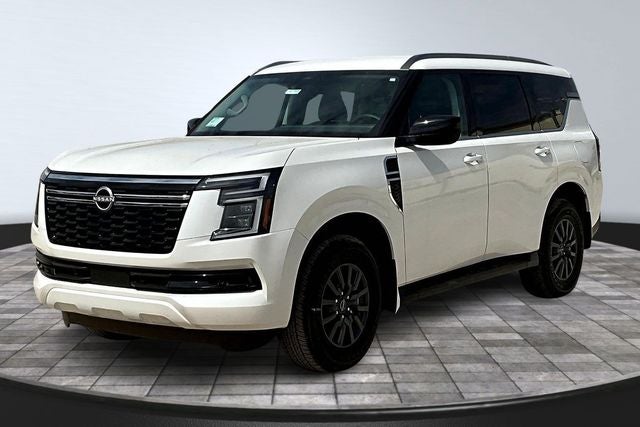 2026 Nissan Armada SV in Aspen White Tricoat — front three-quarter view