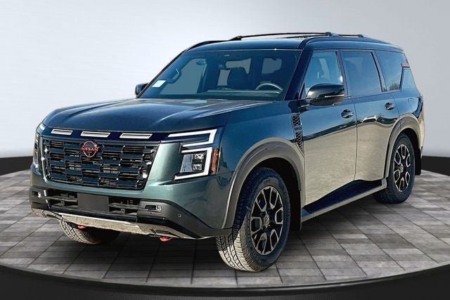 2026 Nissan Armada PRO-4X in Alpine Metallic/Super Blk — front three-quarter view