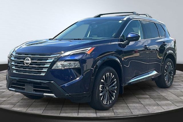 2026 Nissan Rogue Platinum in Deep Ocean Blue Pearl — front three-quarter view