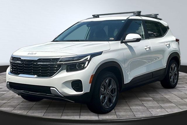 2024 Kia Seltos S in Snow White Pearl — front three-quarter view